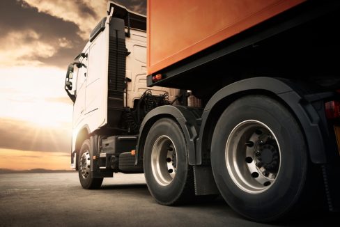 Semi,Trailertrucks,Parked,With,The,Sunset,Sky.,Shipping,Cargo,Container.
